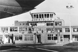 The terminal and air traffic control tower taken from beneath the tail of a Cambrian BAC1-11, 1968.