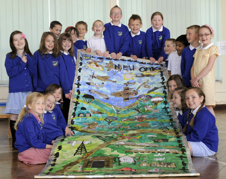 Pupils at New Oak Primary with their collage.