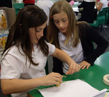 These Year 5 pupils were taking part in a science workshop on 26 May 2010. They are learning about the height of space and making parachutes.