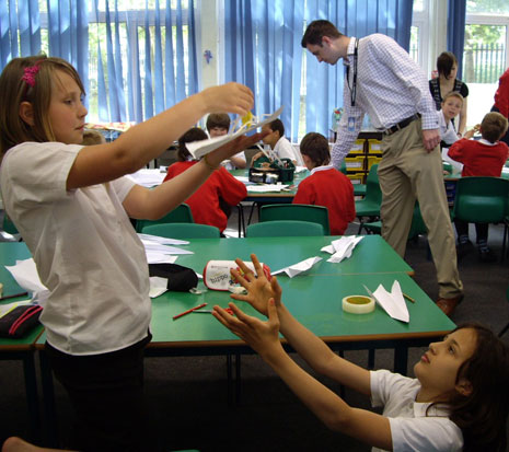 These Year 5 pupils were taking part in a science workshop on 26 May 2010. They are learning about the height of space and making parachutes.