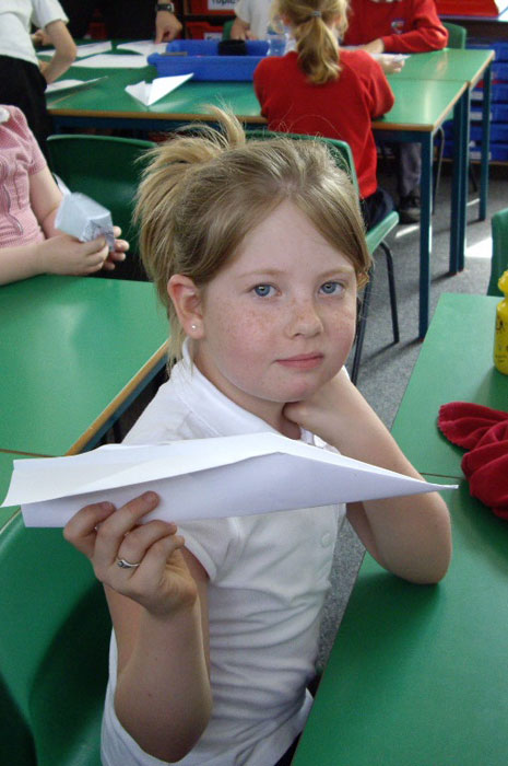 Here are photos of Year 4's science workshop, which took place later that same day. They are making and testing paper aeroplanes.