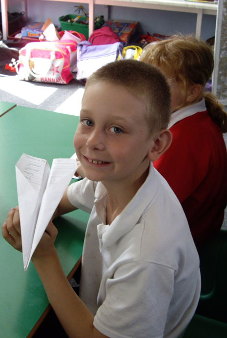 Here are photos of Year 4's science workshop, which took place later that same day. They are making and testing paper aeroplanes.