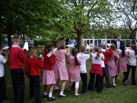 Here are photos of Year 4's science workshop, which took place later that same day. They are making and testing paper aeroplanes.