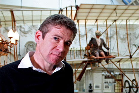 Saul David with the replica Boxkite in Bristol's City Museum and Art Gallery.